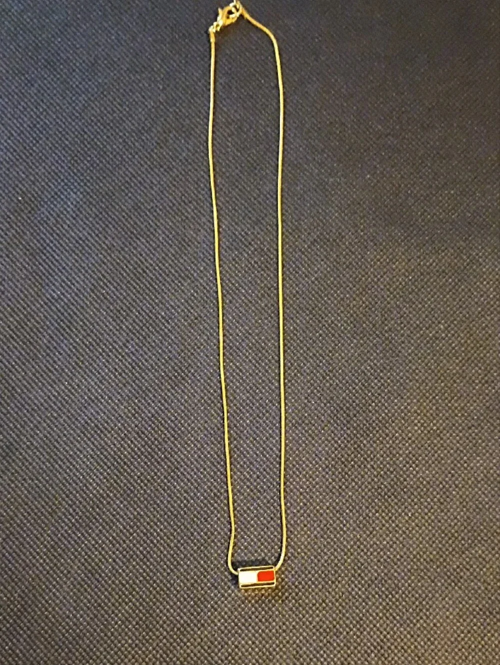 Tommy Hilfiger gold tone